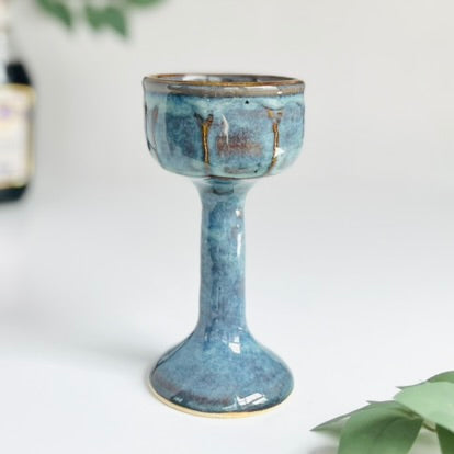 Wheelthrown ceramic stoneware goblets designed as Miriam's Cup for the Passover seder table. Use these ritual cups for Elijah, as a weekly Shabbat kiddish cup, as a unique wine glass, or for any spiritual practice. Glaze On Studio | small batch handmade functional pottery for home and table.