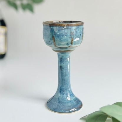 Wheelthrown ceramic stoneware goblets designed as Miriam's Cup for the Passover seder table. Use these ritual cups for Elijah, as a weekly Shabbat kiddish cup, as a unique wine glass, or for any spiritual practice. Glaze On Studio | small batch handmade functional pottery for home and table.