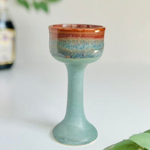 Wheelthrown ceramic stoneware goblets designed as Miriam's Cup for the Passover seder table. Use these ritual cups for Elijah, as a weekly Shabbat kiddish cup, as a unique wine glass, or for any spiritual practice. Glaze On Studio | small batch handmade functional pottery for home and table.