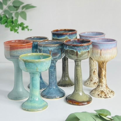 Wheelthrown ceramic stoneware goblets designed as Miriam's Cup for the Passover seder table. Use these ritual cups for Elijah, as a weekly Shabbat kiddish cup, as a unique wine glass, or for any spiritual practice.  Glaze On Studio | small batch handmade functional pottery for home and table.